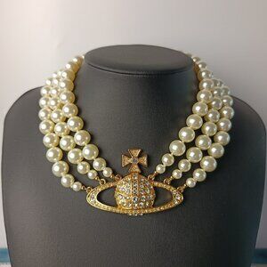 Vivienne Westwood Three Row Pearl Bas Relief Choker in Gold